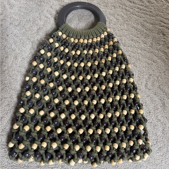 C&C California Handbags - C&C California beaded boho hobo beach bag features a macrame design.